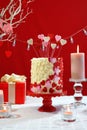 Valentines Day party table with showstopper hearts cake. Royalty Free Stock Photo