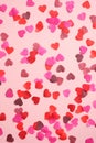 Valentines Day pattern made of hearts on pink background. Suitable for vertical banner, flyer, brochure, stories on social media