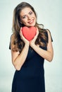 Valentines day portrait of smiling  woman holding heart, symbol of love Royalty Free Stock Photo