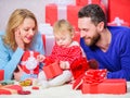 Valentines day. Red boxes. Happy family with present box. father, mother and doughter child. All my love is for you Royalty Free Stock Photo