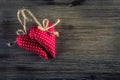 Valentines day. Red cloth handmade hearts on wooden background Royalty Free Stock Photo