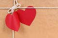 Valentines day red heart shape gift tag, brown paper package par Royalty Free Stock Photo