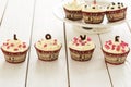 Valentines Day Red Velvet Cupcakes with Sprinkles on Light White Wooden Background, Horizontal View Royalty Free Stock Photo