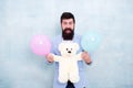 Valentines day. Romantic man with teddy bear and air balloons waiting girlfriend. Romantic gift. Romantic date. Womens