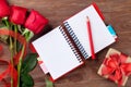 Valentines day roses, gift box and notepad Royalty Free Stock Photo