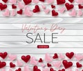 Valentines Day sale banner background with 3d pink and red hearts on wooden surface. Love design concept. Royalty Free Stock Photo