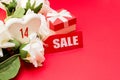 Valentines day sale , gift, roses and white heart on red background. copy space