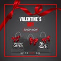 Valentines Day Sale. Realistic Paper shopping bag with handles and red bow, ribbon, isolated on dark background. Vector Royalty Free Stock Photo