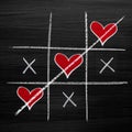 Valentines Day style chalk hearts, XO noughts and crosses Royalty Free Stock Photo