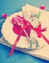 Valentines day table setting with plate, knife, fork, red ribbon Royalty Free Stock Photo