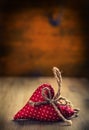 Valentines day. Wedding day. Red cloth handmade hearts on wooden background - table. Free space for your love text Royalty Free Stock Photo