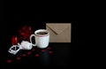 Valentines day or wedding still life scene with cup of coffee, envelope, paper hearts confetti and decorative gift