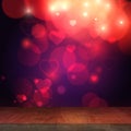 Valentines day. Wooden top table stage with blurred heart bokeh background, empty wooden table festive background
