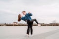 Young couple dancing passionate tango on the square in the park Royalty Free Stock Photo