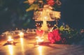 Valentines dinner romantic love concept Romantic table setting decorated with Red heart and couple champagne glass roses flower