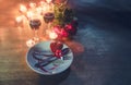 Valentines dinner romantic love concept Romantic table setting decorated with Red heart fork spoon on plate and couple champagne