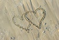 Valentines Drawn on Sandy Beach