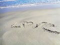 Valentines love word on beach Royalty Free Stock Photo