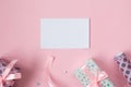 Valentines mockup flat lay with pink gifts, greeting card and glitter hearts. Birthday, Mothers day, Valentines day background