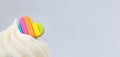 Valentines rainbow heart on top of cupcake Royalty Free Stock Photo