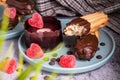 Valentinesday cupcake. Dark chocolate coated digestive biscuit . Sweet delicious dessert truffle and heart shaped candy on a plate