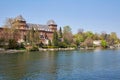 Valentino castle and Po river bank, clear blue sky in Piedmont, Turin, Italy