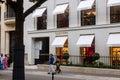 Valentino store in Paris with people walking nearby