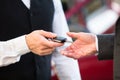 Valet Giving Car Key To Businessperson Royalty Free Stock Photo