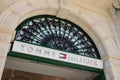 Valetta, Malta - October 22, 2020: Tommy Hilfiger sign. Tommy Hilfiger Corporation is a manufacturer of clothing. It produces and