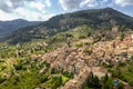 Valldemossa, Mallorca, Spain Sunny day. Beautiful European village in a valley in the mountains, sand colored houses Royalty Free Stock Photo