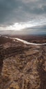 Valle de la Luna Amarillo on a cloudy day at sunset. Aerial view. Rio Negro, Argentina