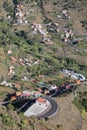 VALLE GRAN REY, LA GOMERA, SPAIN: View of the valley with terraced fields and mountains. Winding road and the church of San Antoni Royalty Free Stock Photo