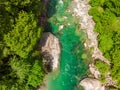 Valle Verzasca - Aerial View of clear and turquoise water stream and rocks in Verzasca River in Ticino - Verzasca Valley in Tessin Royalty Free Stock Photo