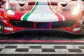 Ferrari GT racing touring car front detail on asphalt circuit starting line Royalty Free Stock Photo