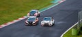 Honda and Opel acing touring cars action challenging and overtaking during