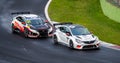 Honda and Opel acing touring cars action challenging and overtaking during