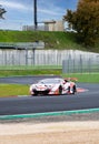 Lamborghini Huracan supercar gran turismo racing in action at turn on