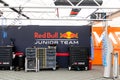 Red Bull motorsport racing team logo brand in real workspace of circuit box