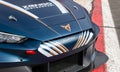 Cupra logo and name detail on electric racing touring car