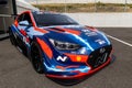 Modern Hyundai Electric racing car in circuit paddock full length