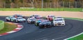 Nascar cars formation lap aligned for rolling race start Royalty Free Stock Photo