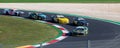 Nascar cars racing challenging on racetrack, overtaking at turn