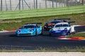 Touring cars in cation during the race