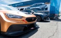 Cupra logo sign on snout front touring car in outdoors showroom