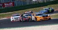 American festival of Rome. Group of Nascar cars challenging overtaking during Nascar