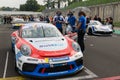 Porsche Carrera cup championship, Coronavisrus in sport, car and team people on