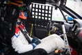 Racing weekend. Touring car driver with helmet and suit sitting in cockpit Royalty Free Stock Photo