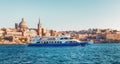 Valletta citiscape with bay cruise boat Royalty Free Stock Photo