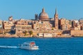 Valletta citiscape with bay cruise boat, Malta Royalty Free Stock Photo