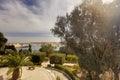 Valletta city harbor area and an outdoor park at Malta, with many historic buildings along the coastline Royalty Free Stock Photo